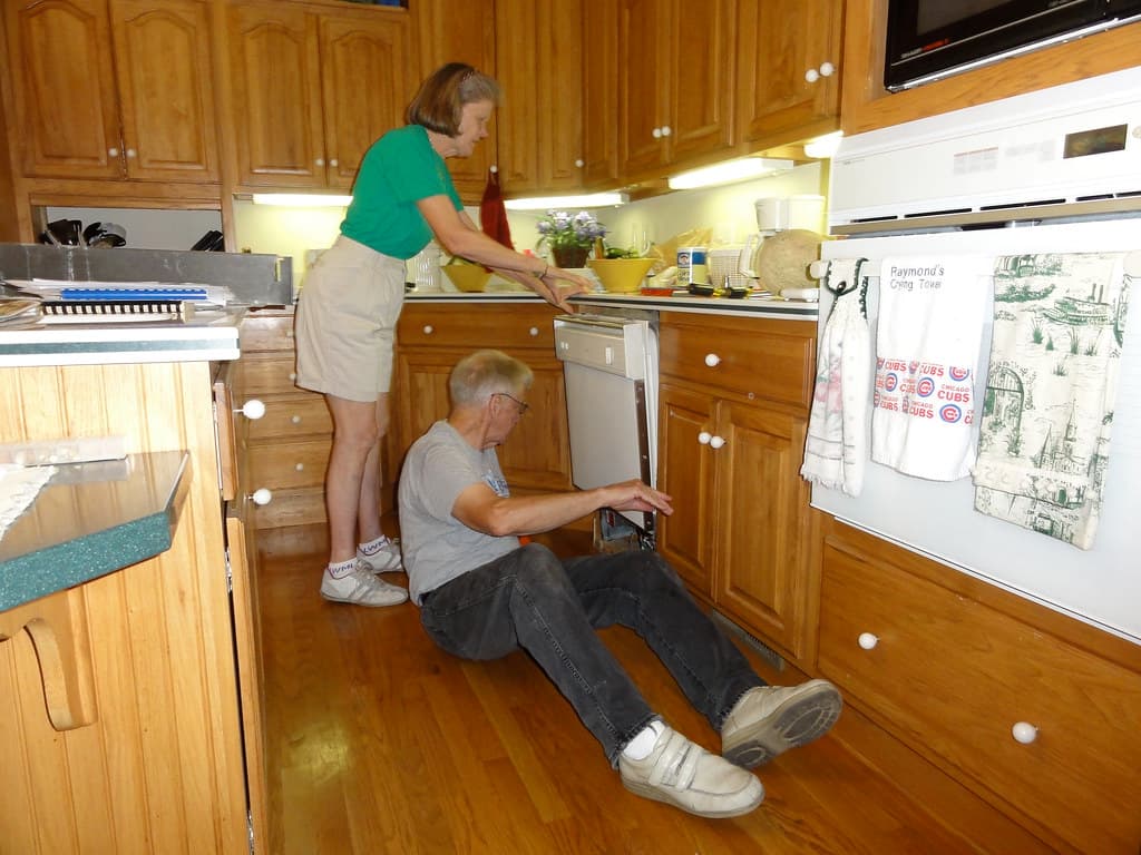 Technician providing home appliance repair service